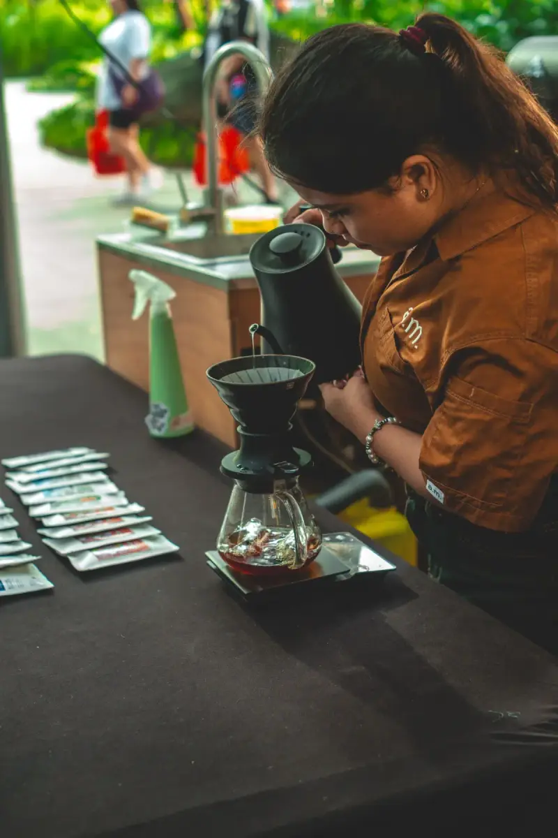 Barista preparing coffee at an outdoor event