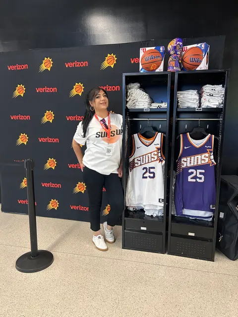 Phoenix Suns booth by Purple Exhibits: close-up of a Verizon and Phoenix Suns step-and-repeat wall