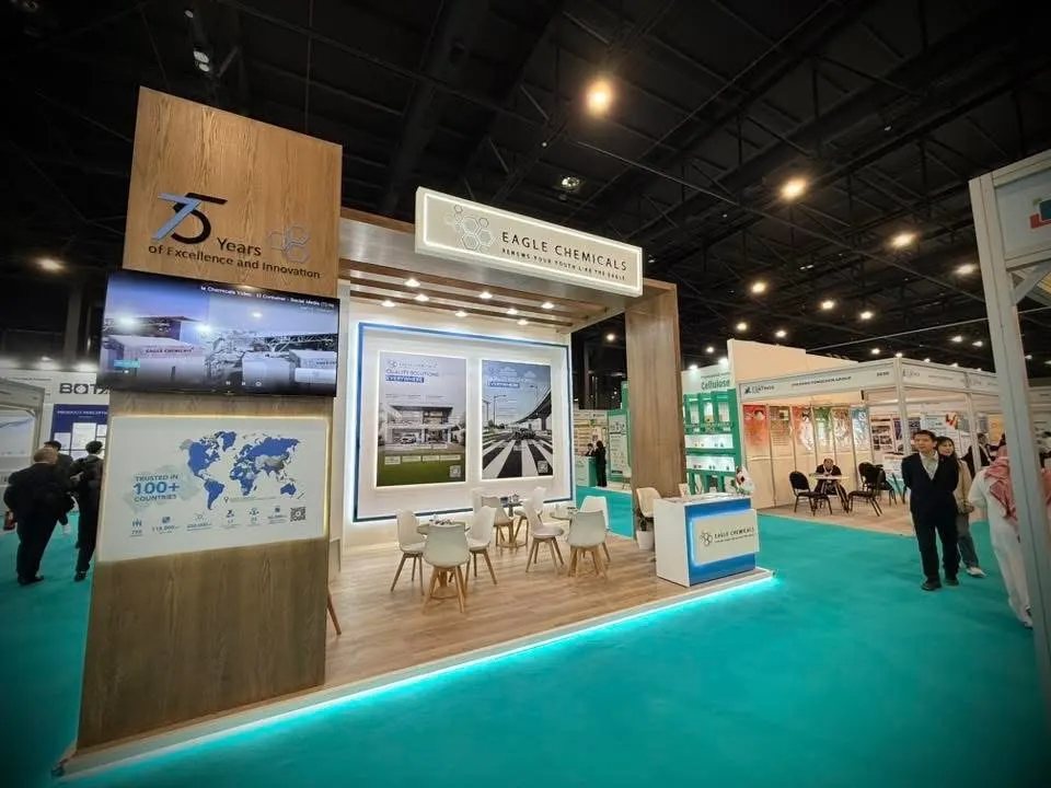 Eagle Chemicals booth by Purple Exhibits: alternate angle of the Eagle Chemicals wood-clad island booth showing the '75