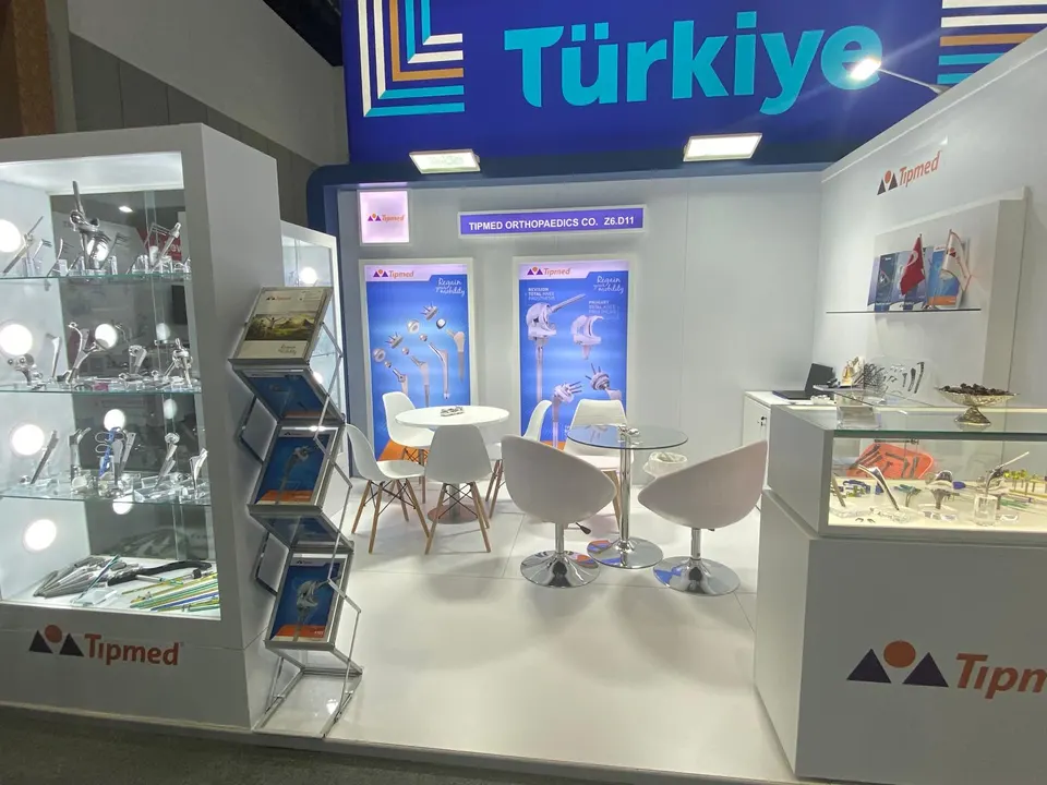 Tipmed booth by Purple Exhibits: tipmed orthopaedics booth in a Türkiye pavilion with white walls, one of our builds to compare for NCPA Annual Convention