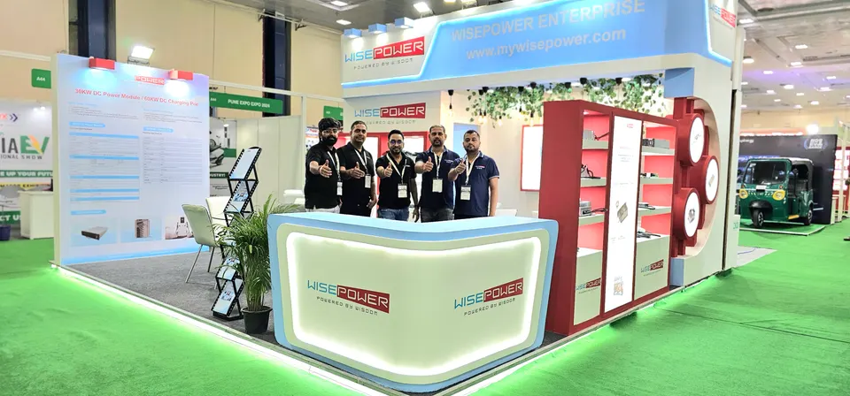 Wisepower Enterprise booth by Purple Exhibits: finished Wisepower Enterprise booth with a light-blue header, red logo, like the booths we plan for Gastech