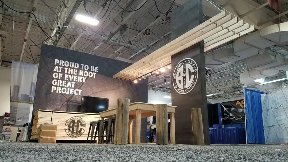 Booth by Purple Exhibits: low-angle view of a dark charcoal back wall printed, shown for International Mass Timber Conference & Expo exhibitors