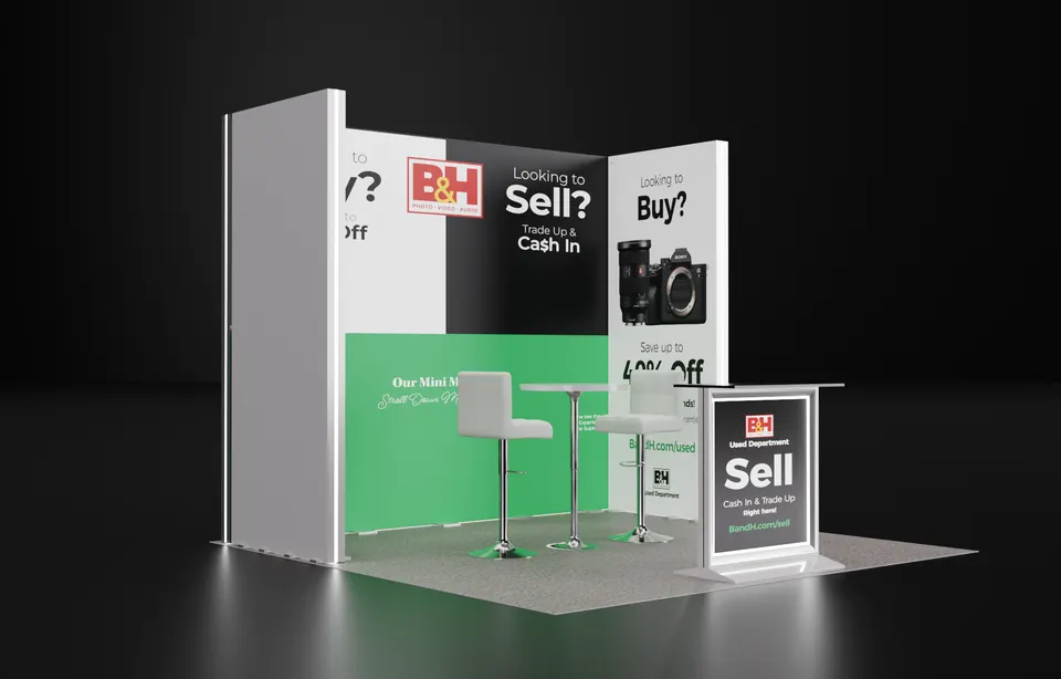 Purple Exhibits booth design concept: Render of a 10x10 inline booth for B&H Used Department with white, black and green graphics reading Looking to Sell? Trade Up & Cash In, a camera image, two white bar stools at a high table and a branded counter.