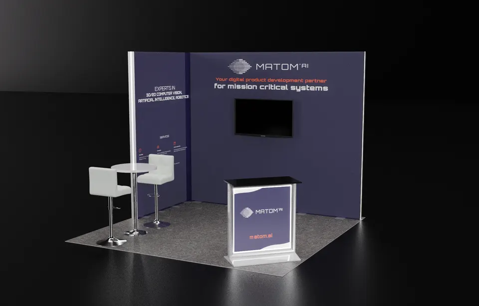 Purple Exhibits booth design concept: 3D render of a 10x10 inline booth with a dark navy back wall, wall-mounted TV, white reception counter with Matom AI logo and a white bar table with stools on grey flooring.