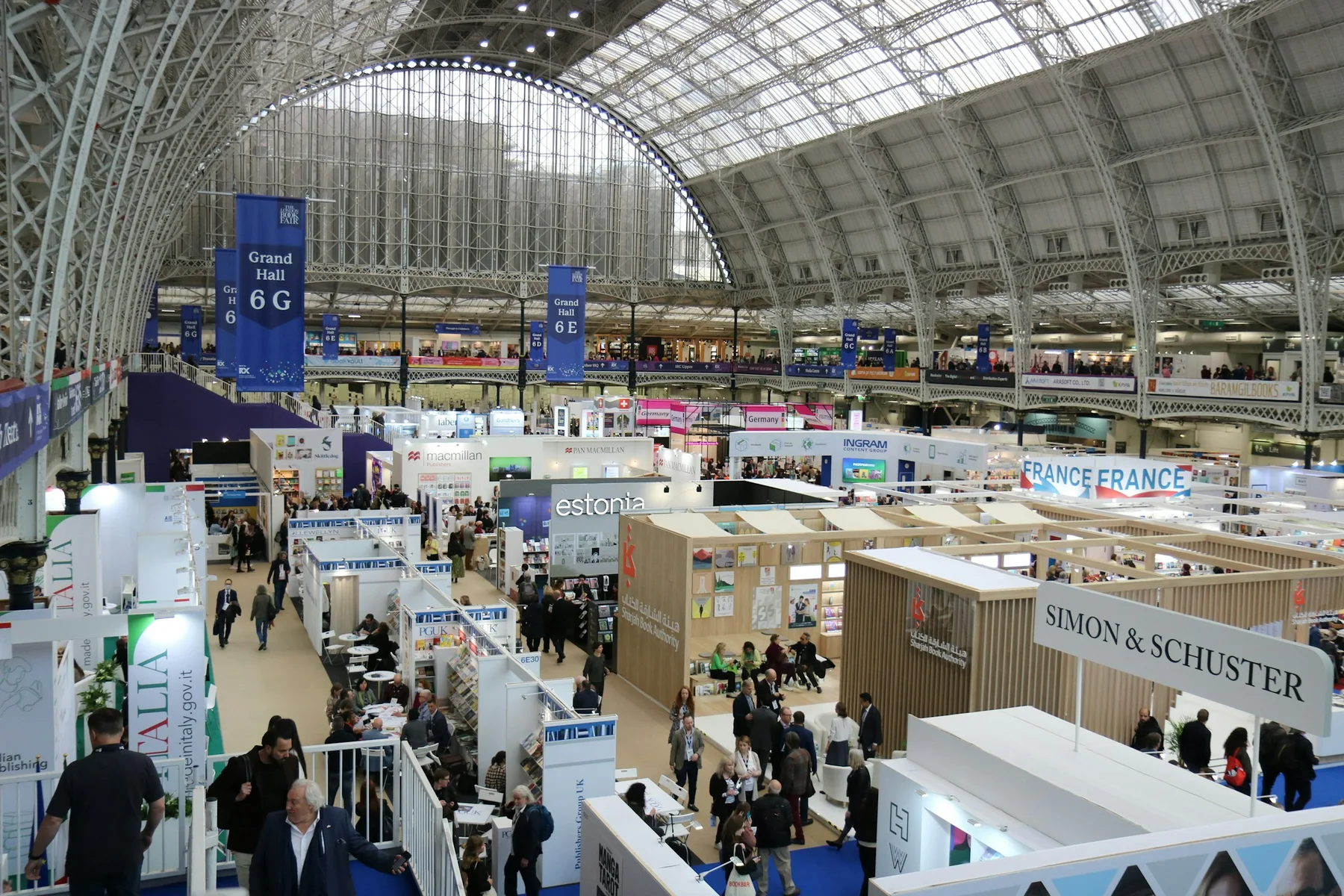 London Book Fair exhibition floor at Olympia London Exhibition stands and visitors fill the London Book Fair at Olympia London.