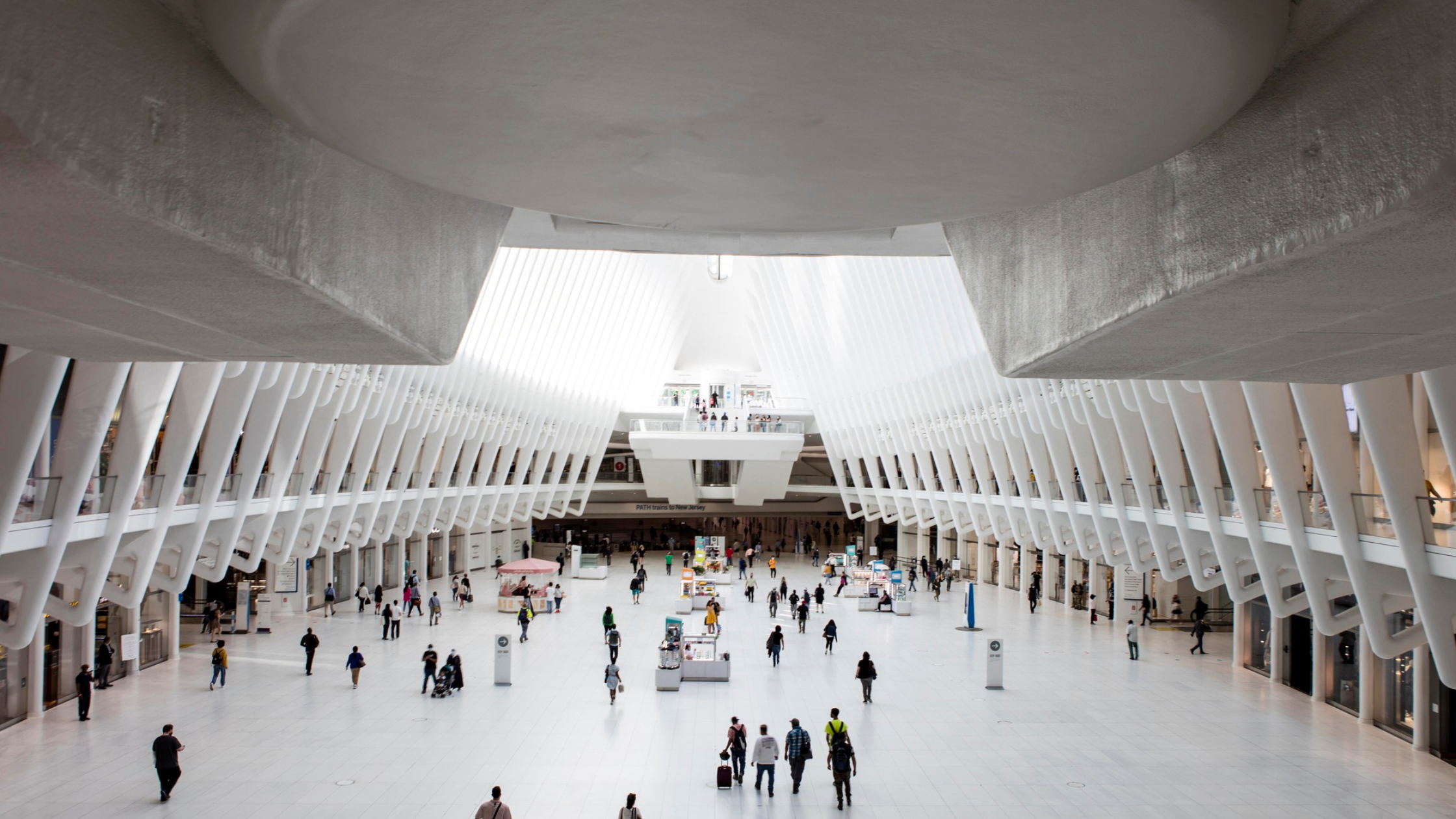 Wide view of a busy convention hall featuring scalable structures from an Exhibit Fabrication Company Orlando and Branded Event Displays Orlando.