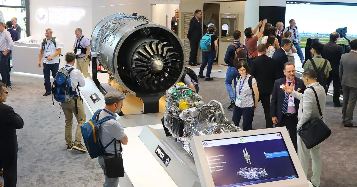 Large Pratt and Whitney aircraft engine showcased at an aviation MRO exhibition
