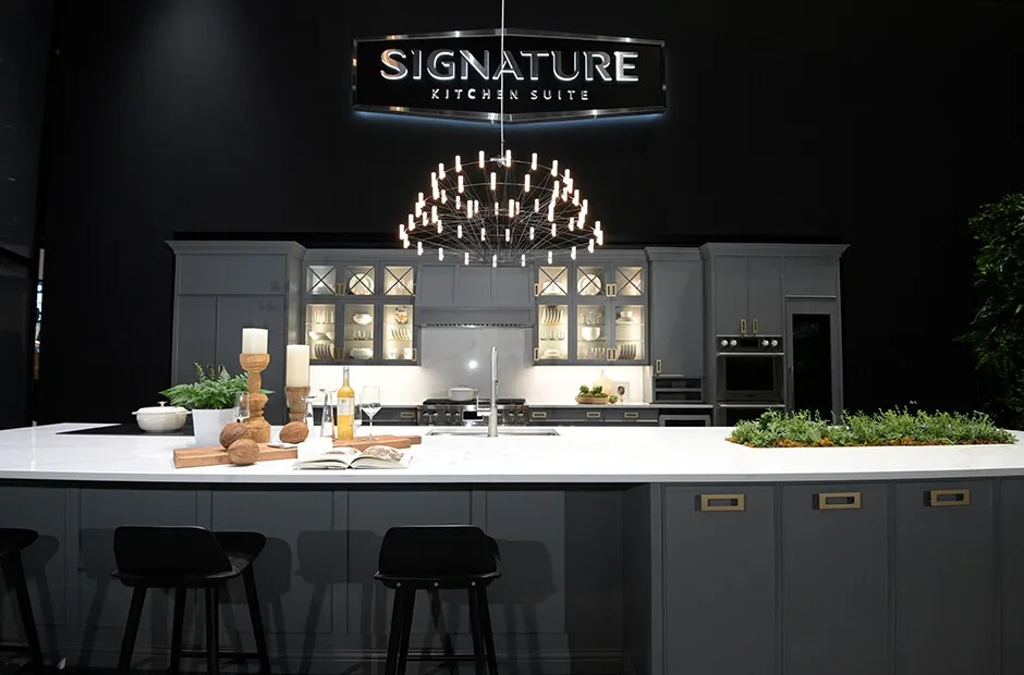 Professional exhibit lighting highlighting products inside a trade show booth