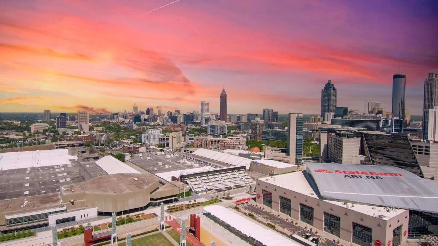 Aerial sunset view of the Georgia World Congress Center with the downtown Atlanta skyline