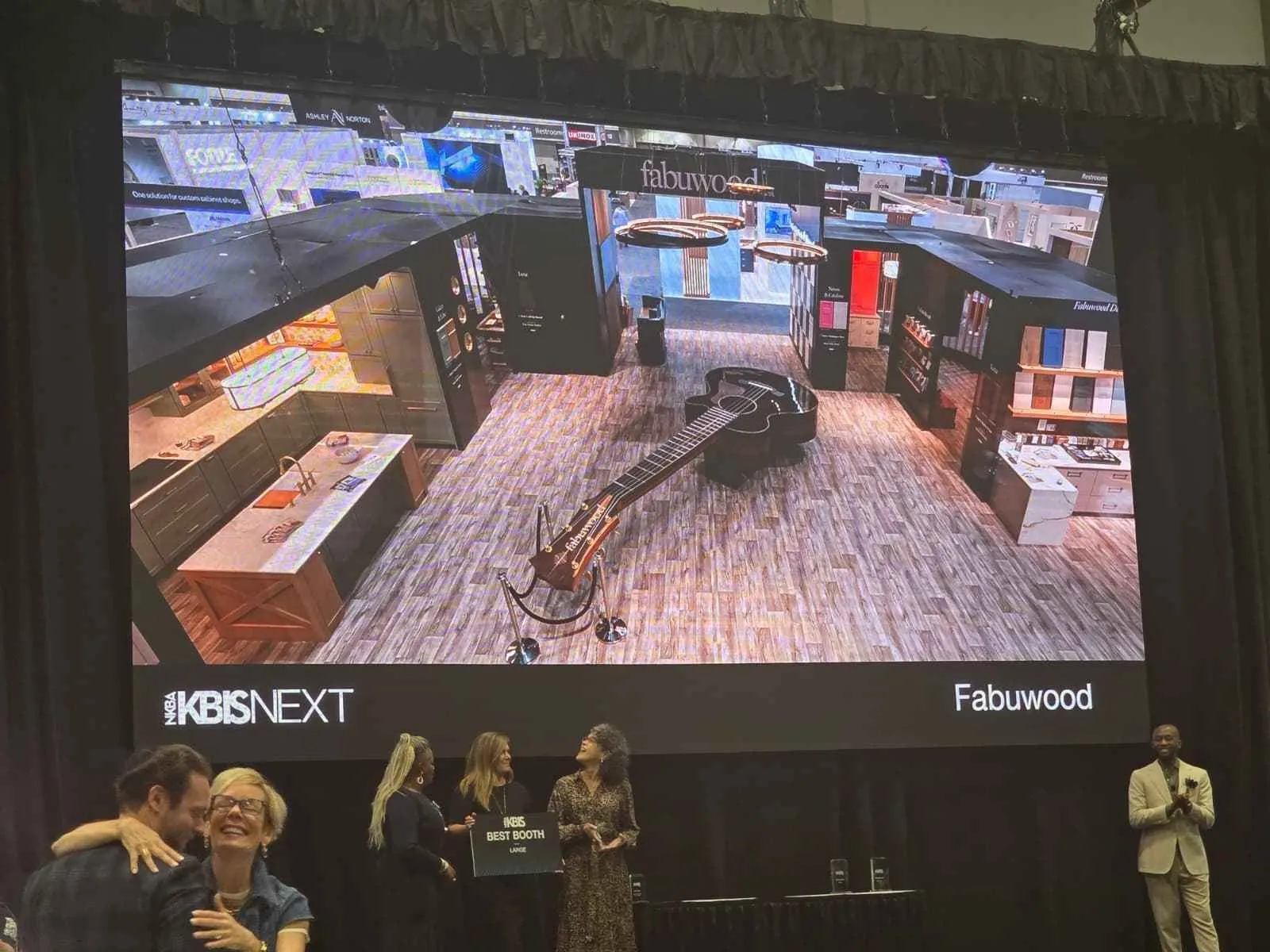 Fabuwood receiving the Best Large Booth award at KBIS 2026 in Orlando