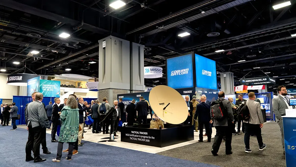 SATShow attendees viewing a live satellite communications demonstration in Washington DC