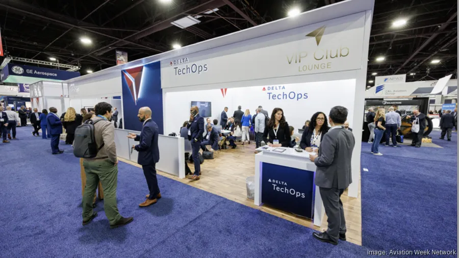 Large Delta TechOps VIP exhibit and networking lounge at the MRO Americas trade show