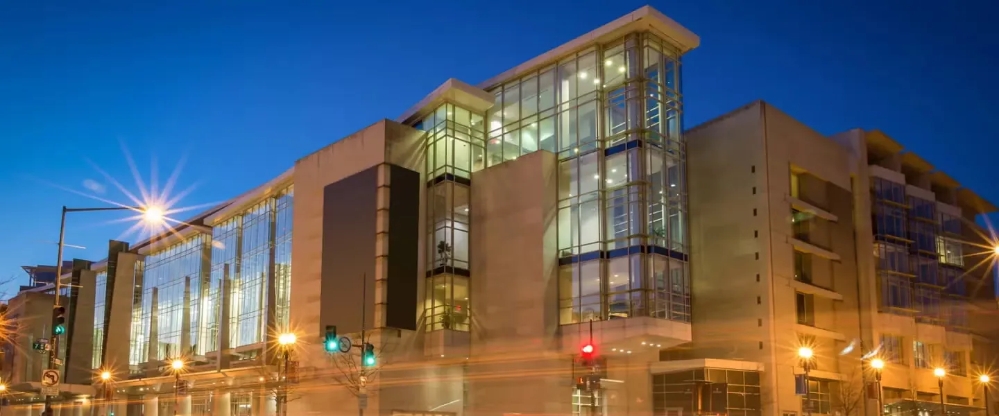 Walter E. Washington Convention Center illuminated at dusk in downtown Washington, D.C.
