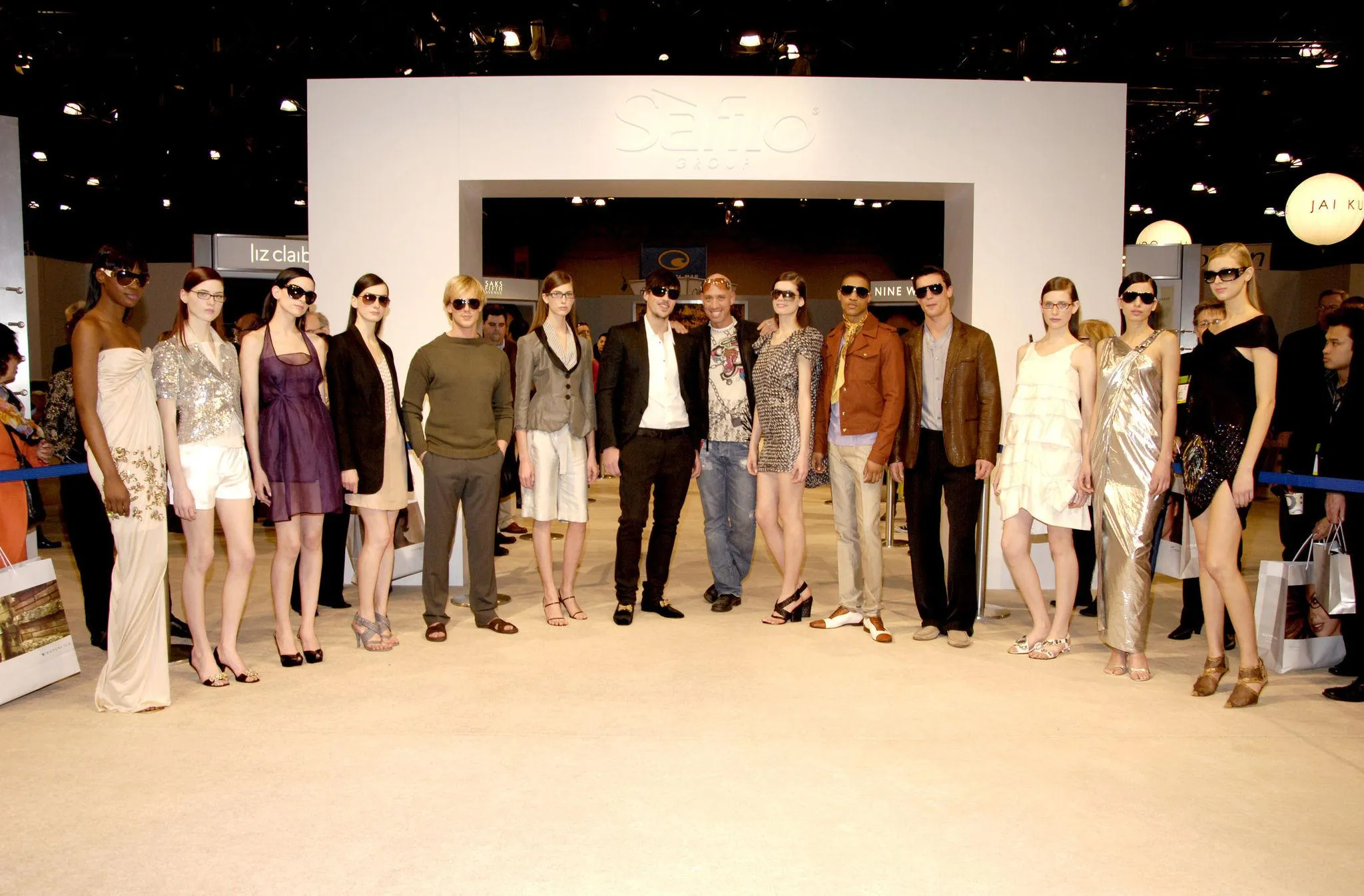 Female models presenting designer sunglasses together during the Vision Expo fashion show in Las Vegas