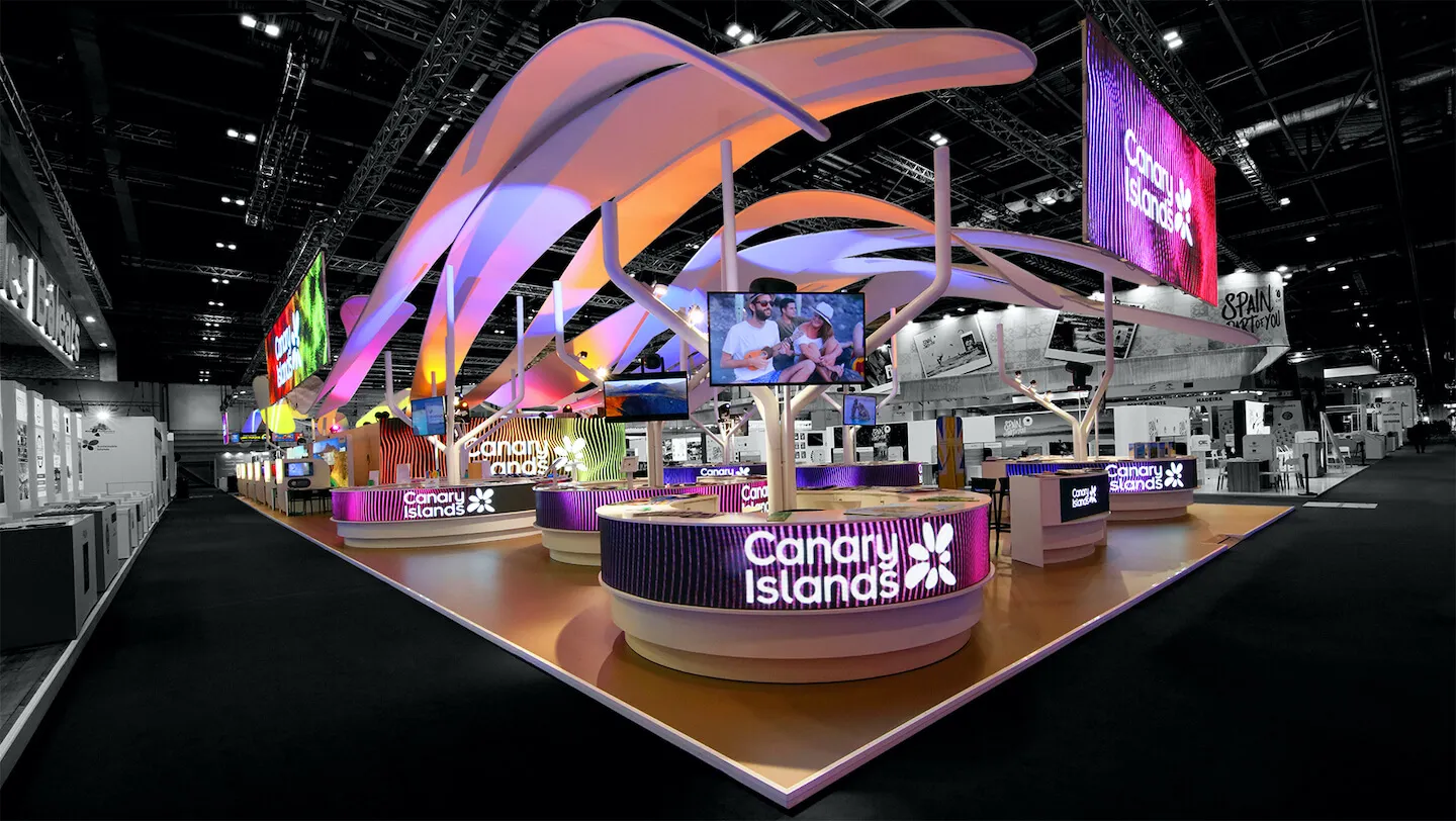 Award-winning luxury exhibit with sweeping architectural canopies, curved LED screens and interactive visitor stations