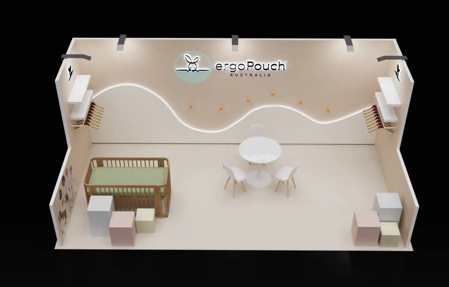 ergoPouch 10x20 peninsula trade show booth with an open nursery vignette and baby furniture display
