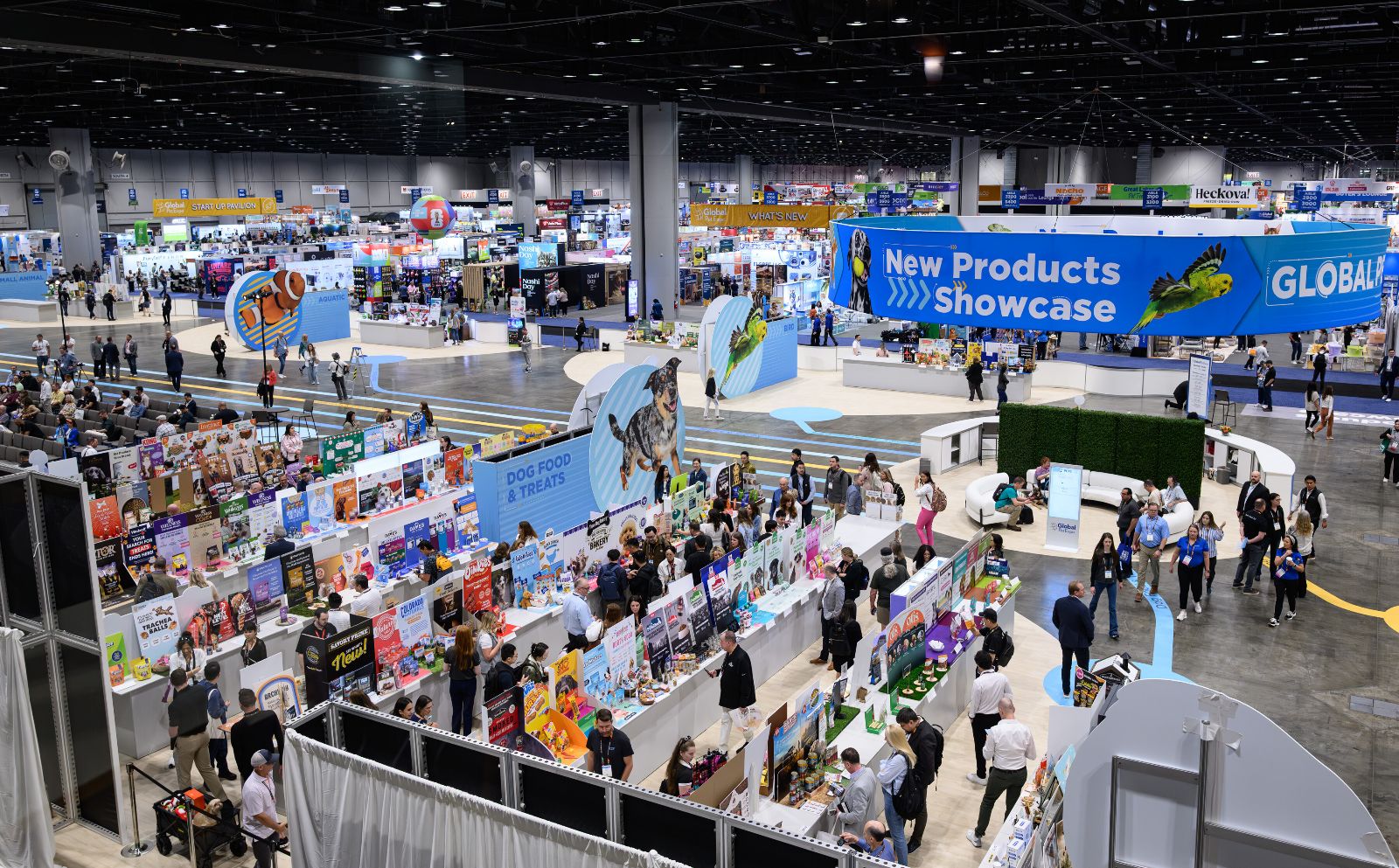 Attendees entering Global Pet Expo beneath the show logo, with 2025 edition signage visible