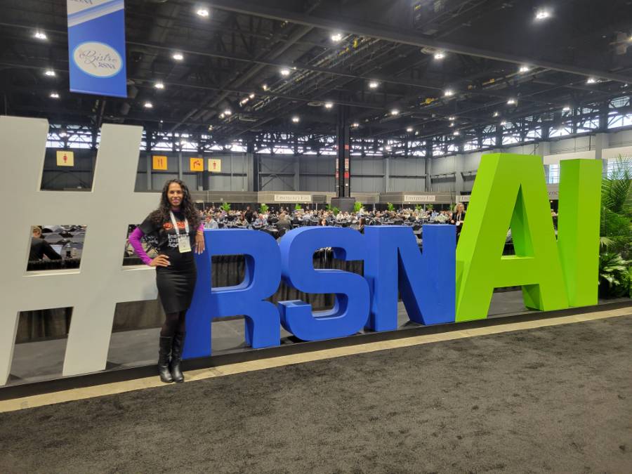 Booth representative at the RSNA sign, McCormick Place