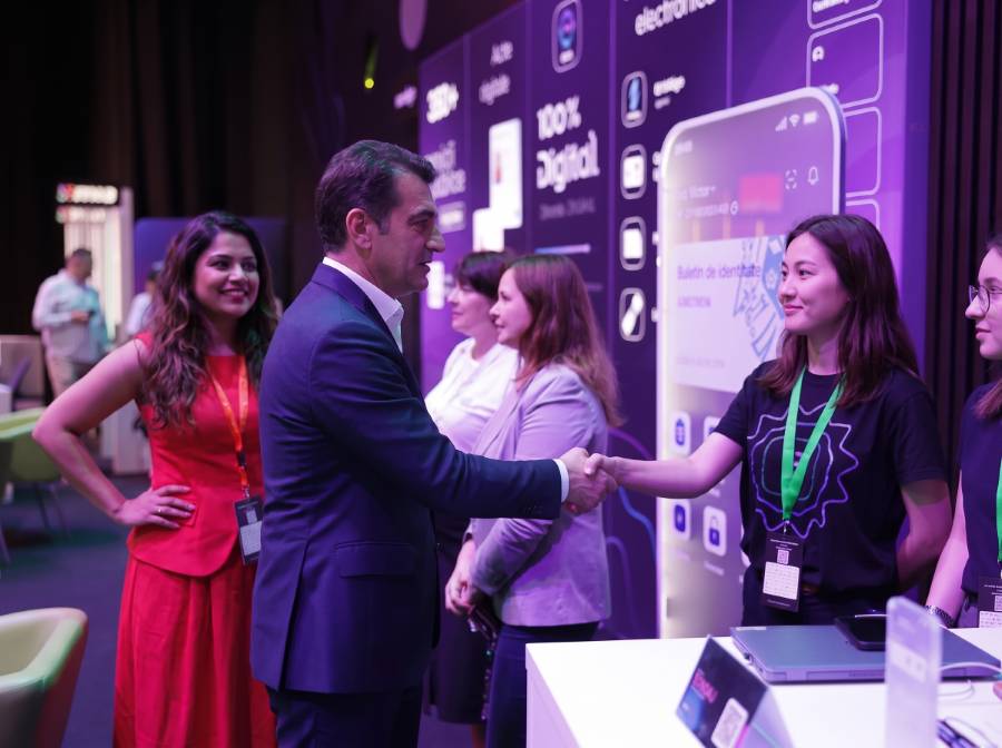 Booth staff capturing leads at a tech exhibit