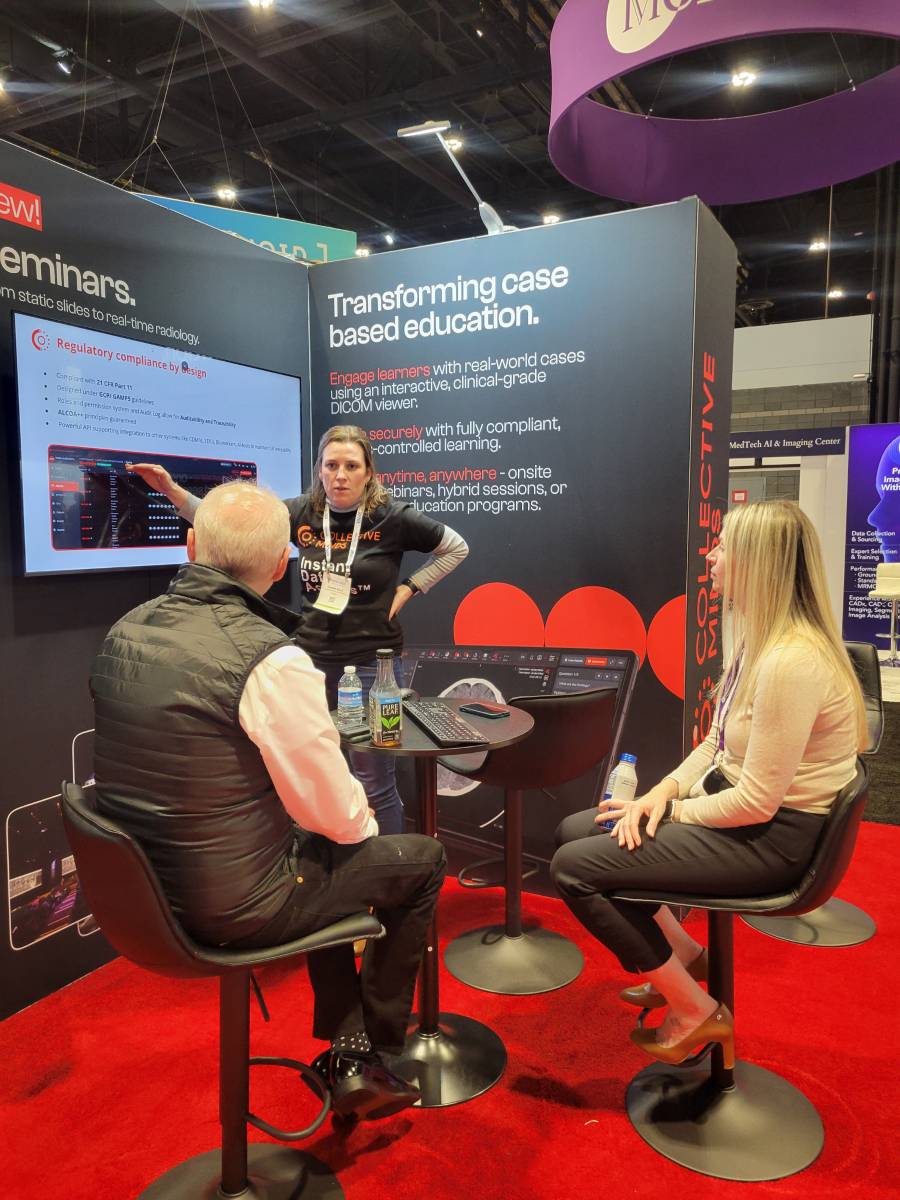 Product specialist presenting at a medical imaging booth
