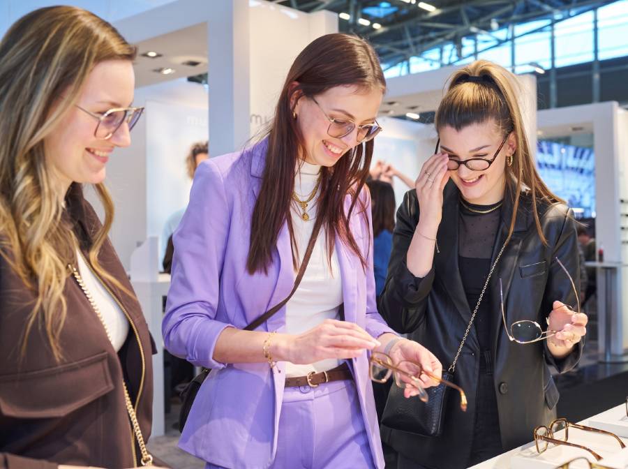 Product specialists presenting eyewear to buyers